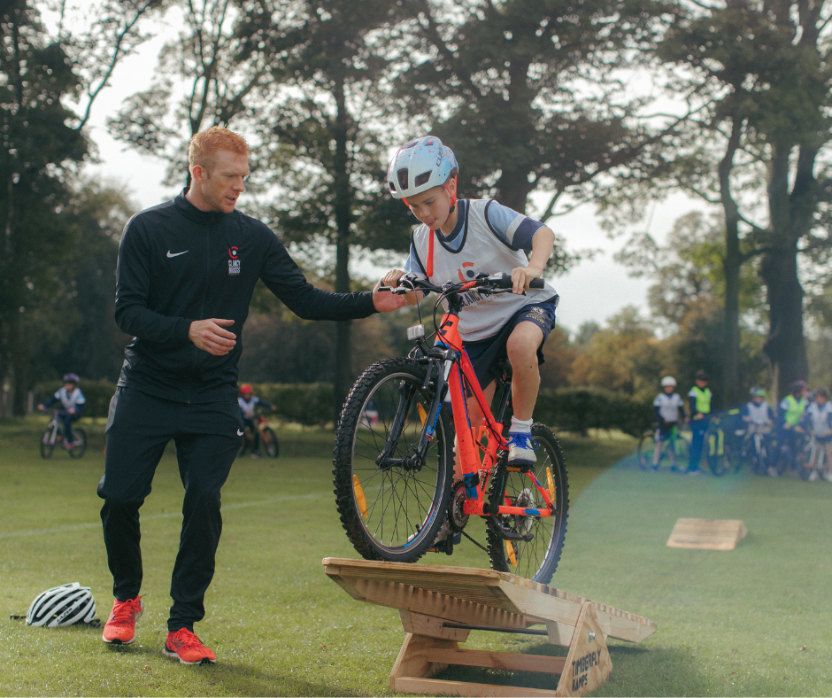 A young rider tackles the see-saw ramp.